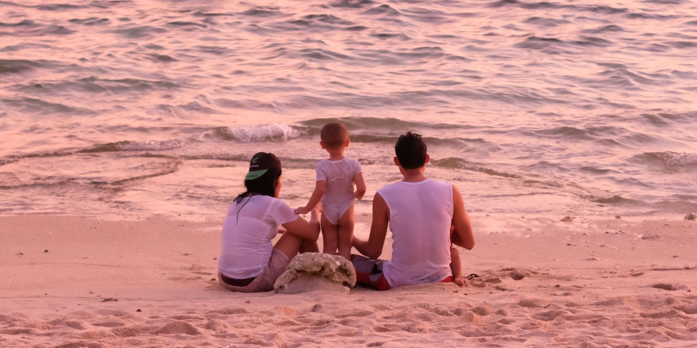 A family at the beach | Source: Pexels