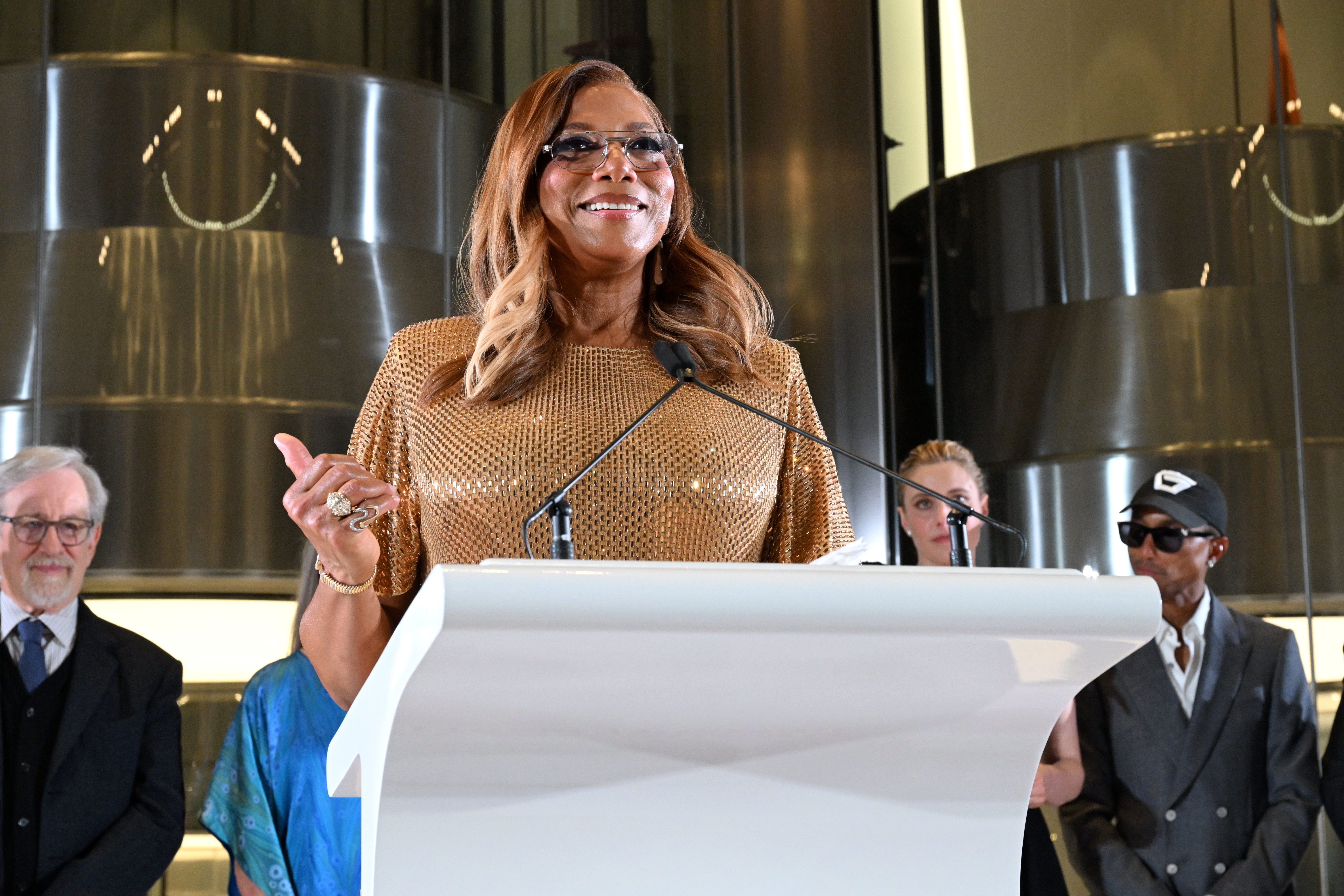 Queen Latifah opened the celebration by urging guests to appreciate the historic nature of being present when a major new cultural institution first welcomed visitors. She told the crowd to "soak this in" rather than spend the entire evening catching up with fellow stars. | Source: Getty Images