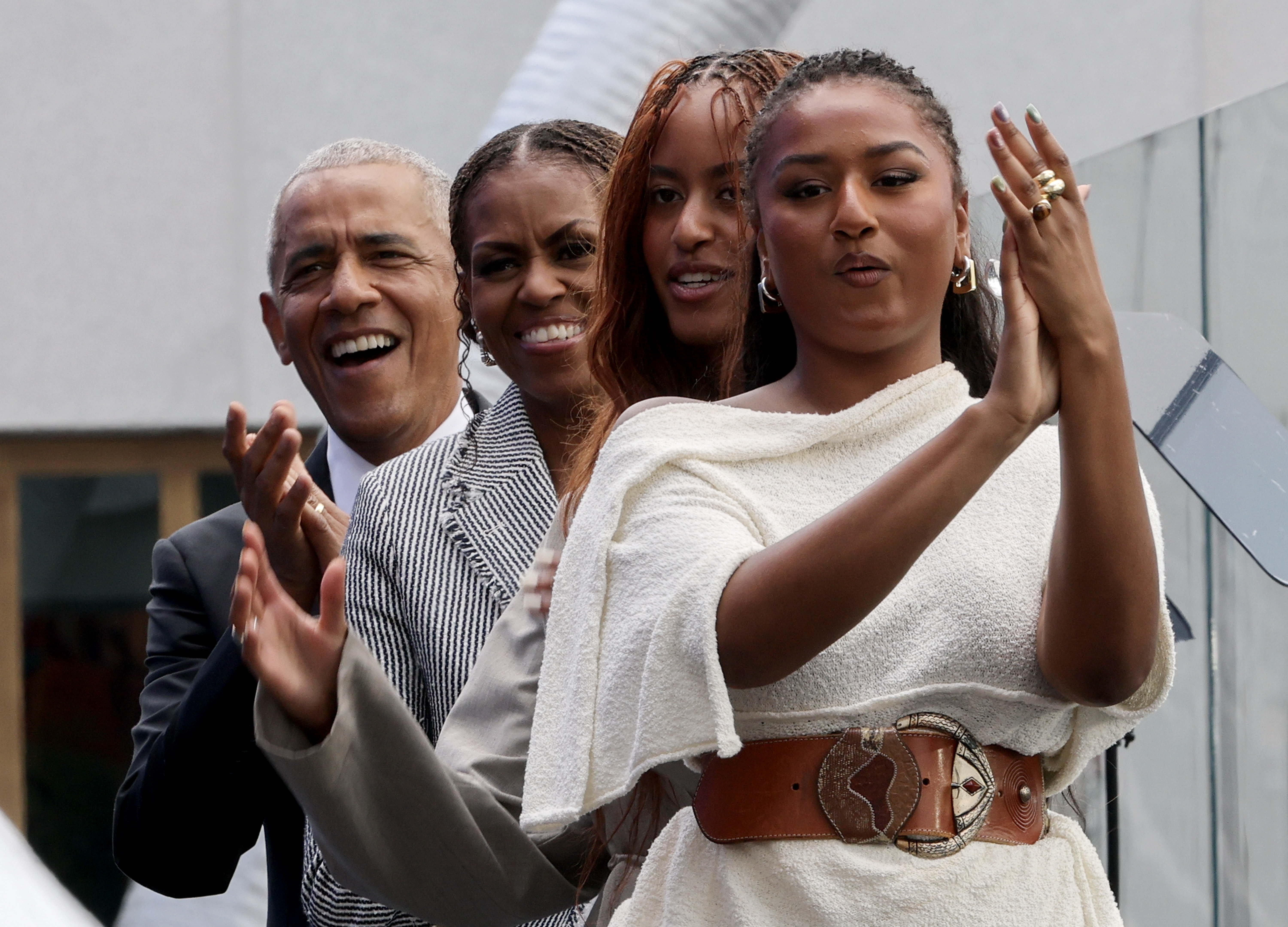 Malia and Sasha joined their parents at the June 18, 2026, dedication, where the family was photographed cheering after Eddie Vedder and Guitars Over Guns performed. | Source: Getty Images