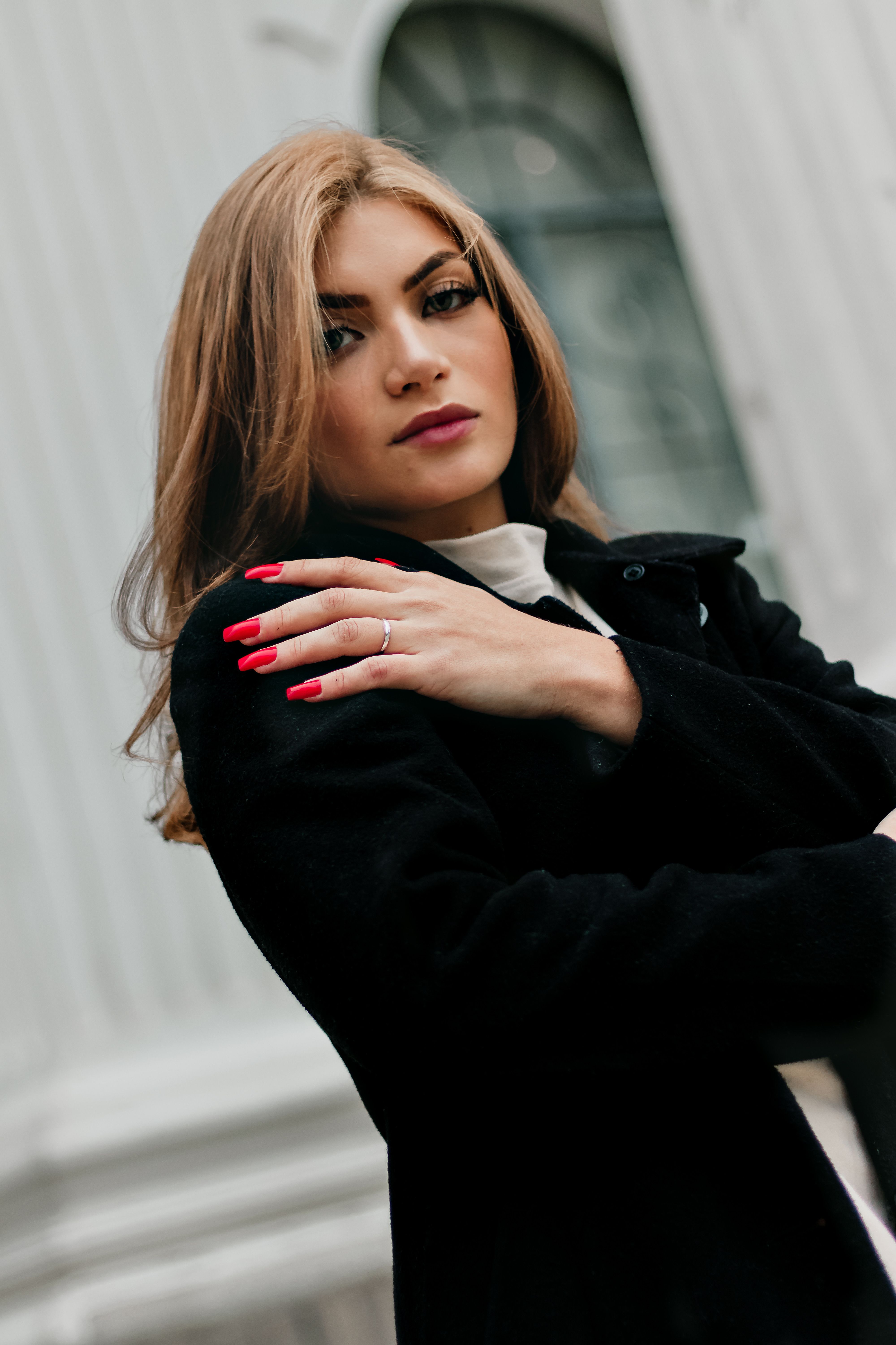 A confident woman with red nail polish | Source: Pexels