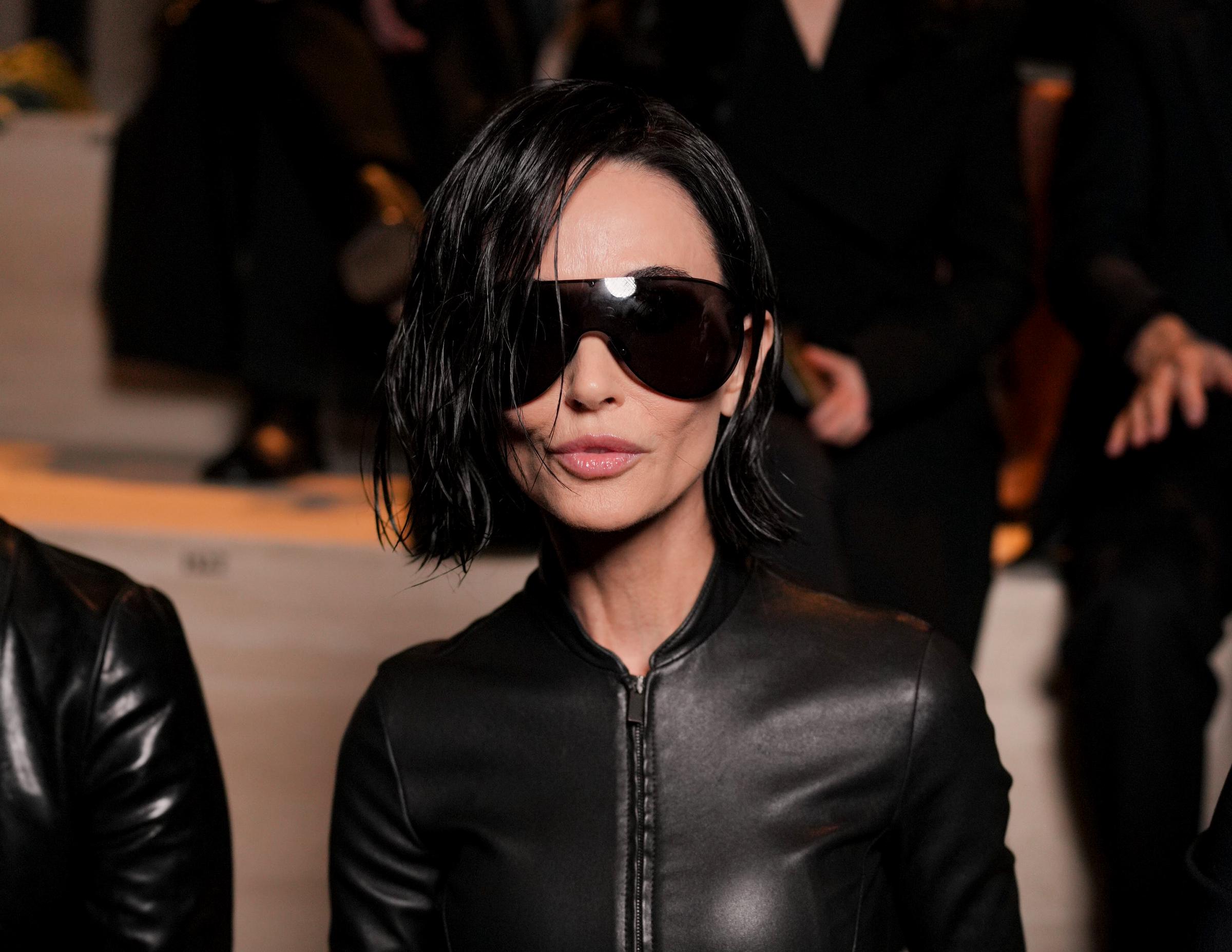 During Milan Fashion Week in February 2026, Moore appeared at the Gucci Fall/Winter 2026 show with another dramatically shortened hairstyle. She attended the February 27 event as Demna Gvasalia took the helm of the Italian fashion house. | Source: Getty Images