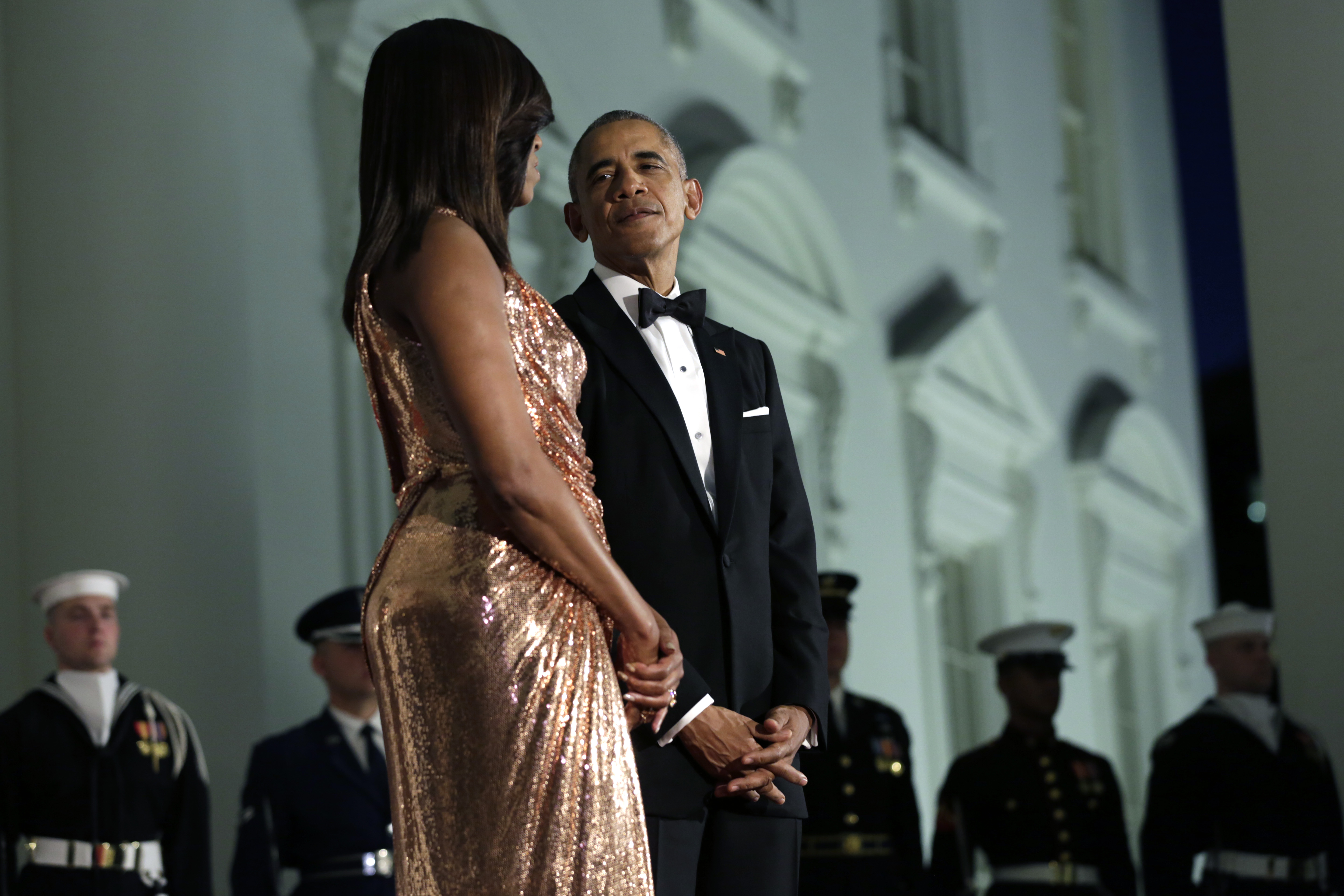 Michelle wore Atelier Versace for the October 2016 dinner, one of the final major formal evenings she and Barack hosted as president and first lady. | Source: Getty Images