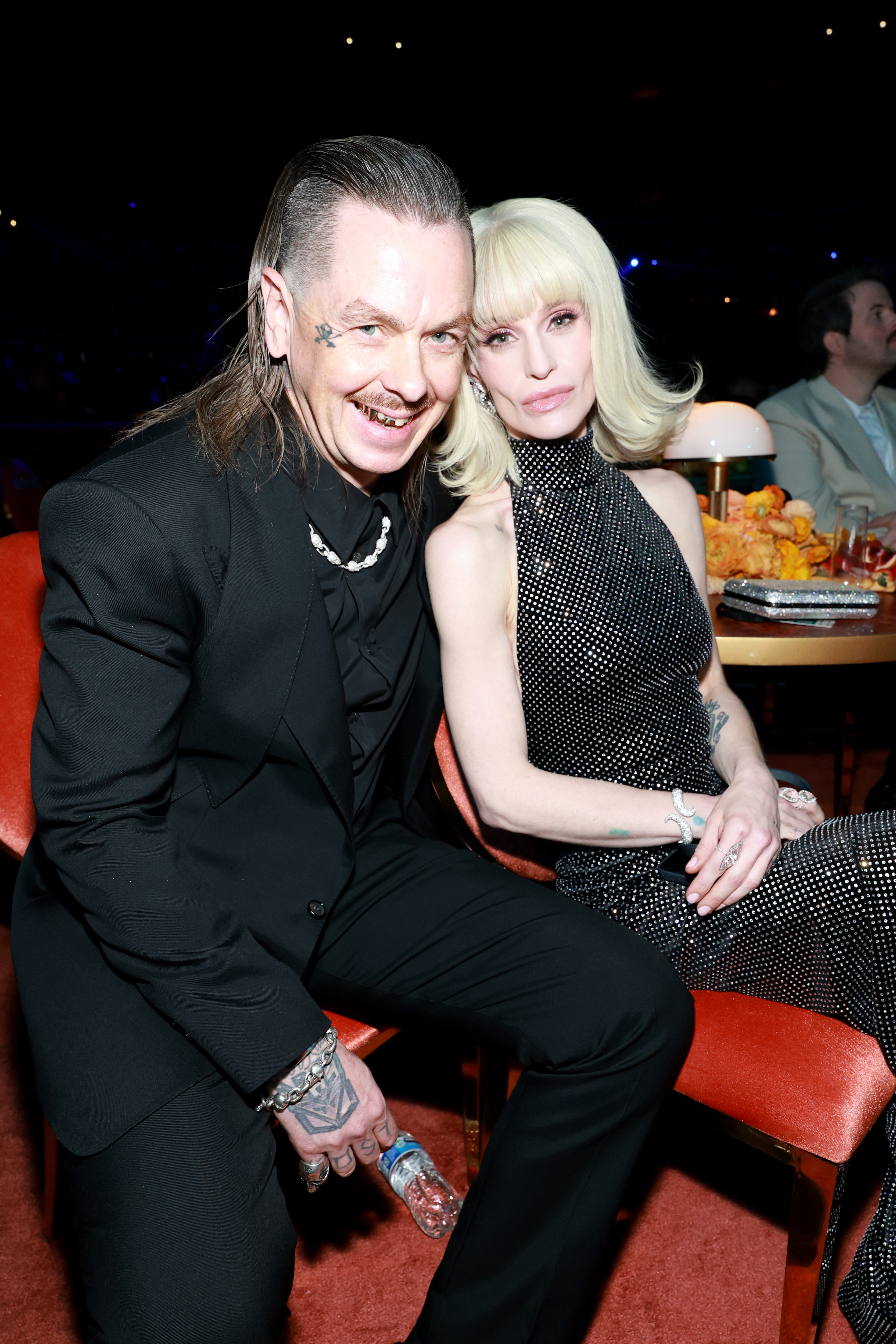 Kelly Osbourne and Sid Wilson shared a close moment at the 2026 Grammy Awards in Los Angeles, posing together in coordinated black outfits just weeks before their engagement came to an end. | Source: Getty Images