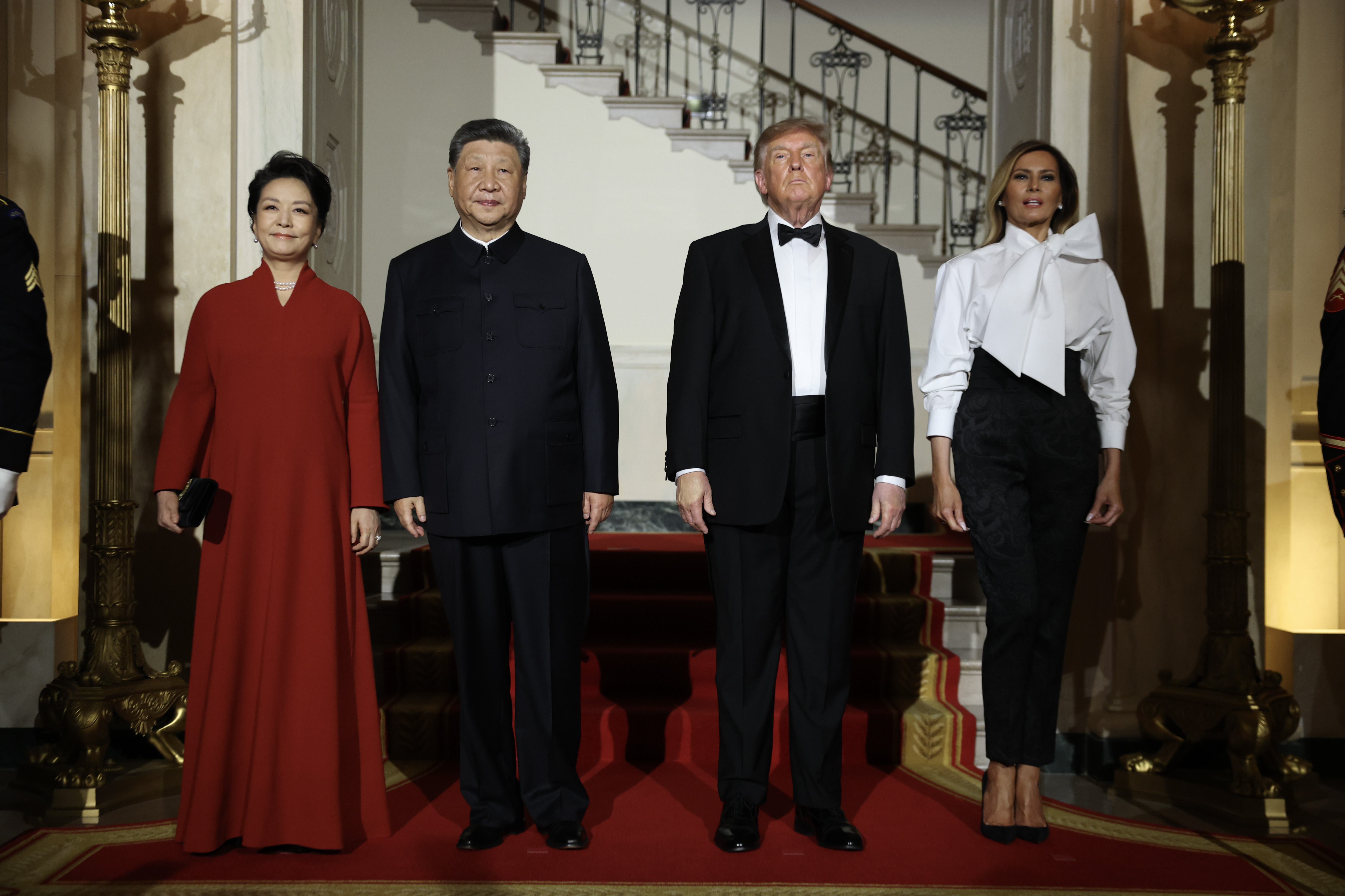 The East Room featured red linens, dahlias, and ranunculus, with Melania’s office saying the color was chosen in part for red’s cultural significance in China.