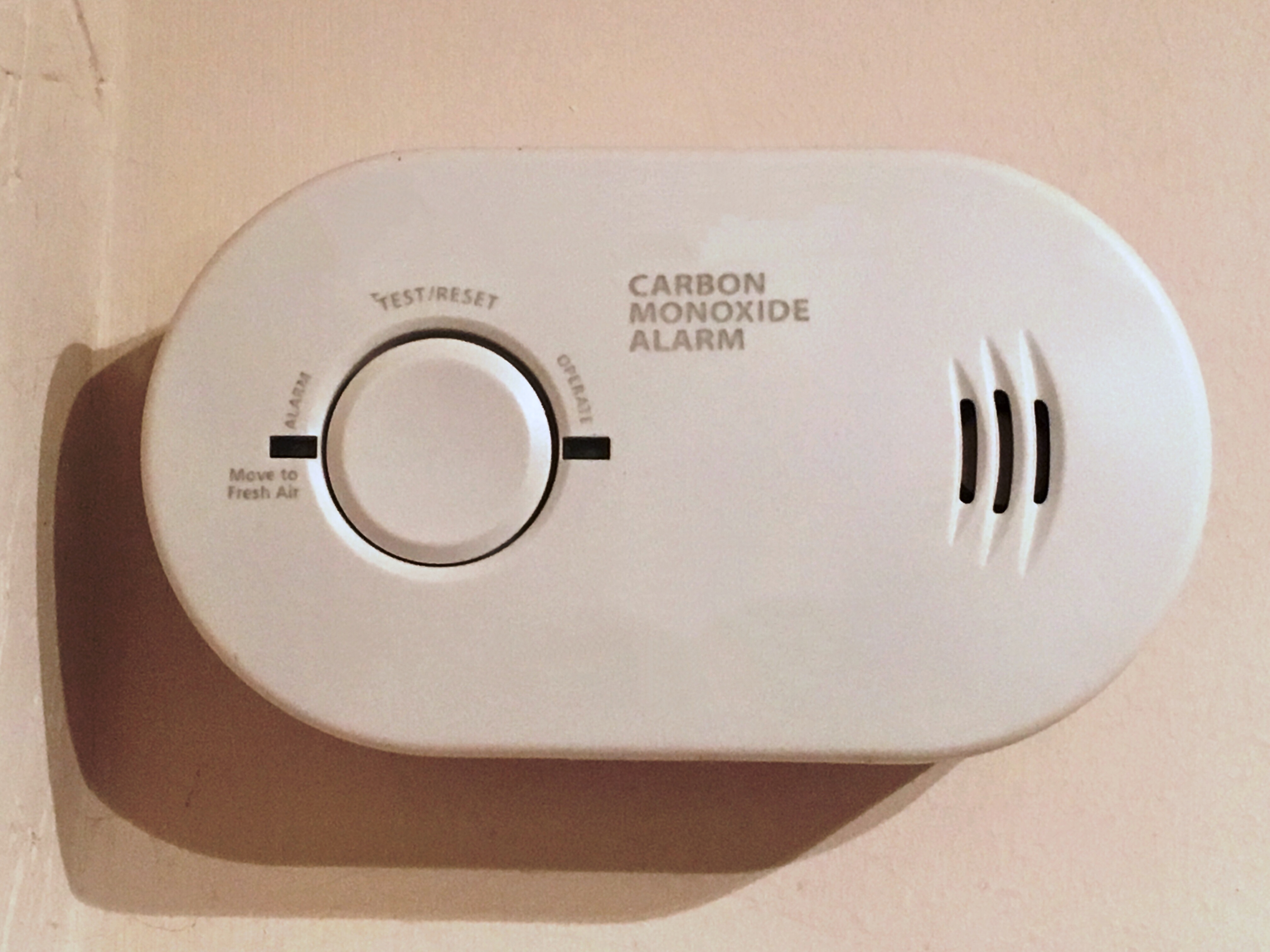 A carbon monoxide alarm mounted on a wall | Source: Getty Images