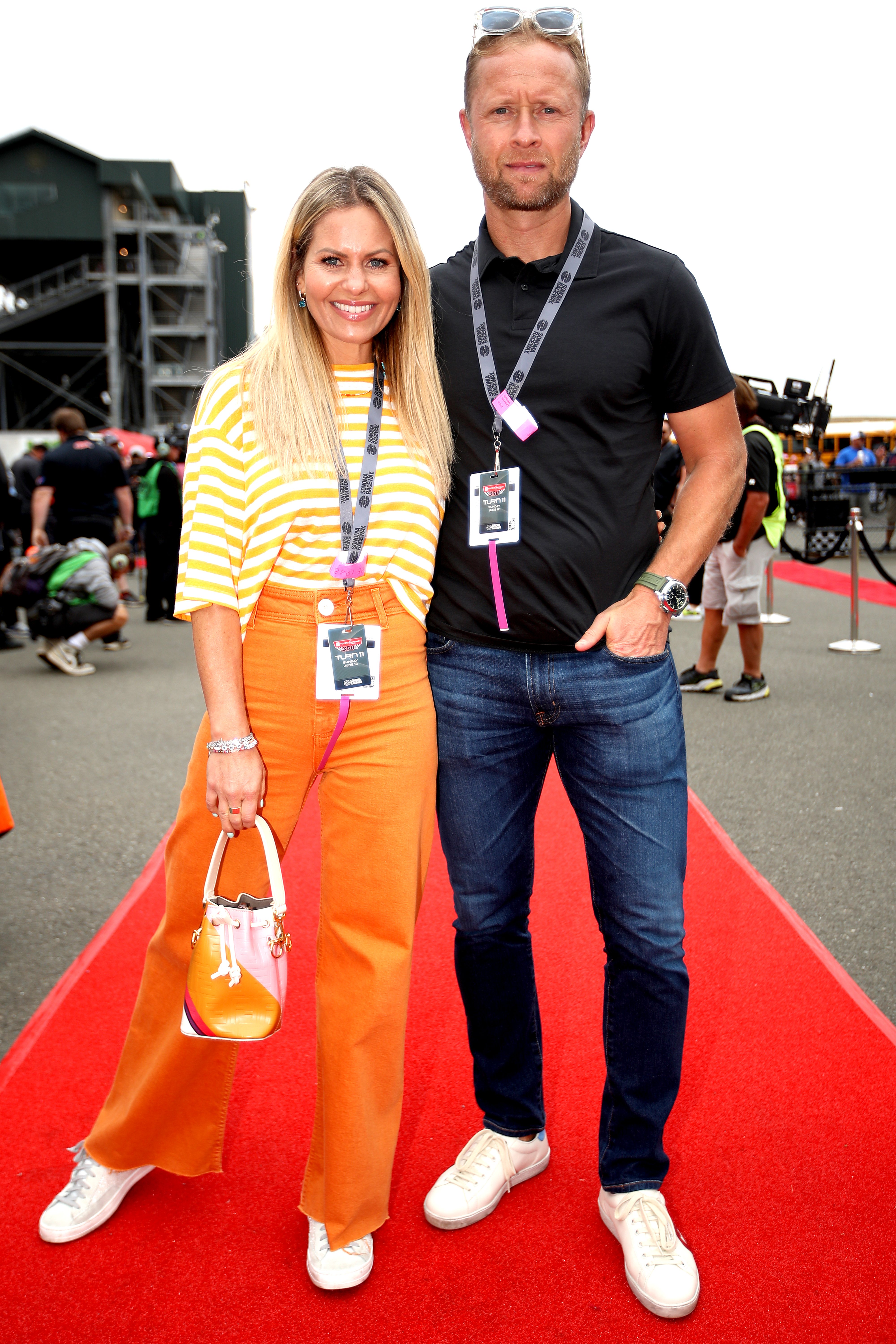 Candace Cameron Bure and Valeri Bure on the red carpet before the NASCAR Cup Series Toyota/Save Mart 350 on June 12, 2022, in Sonoma, California