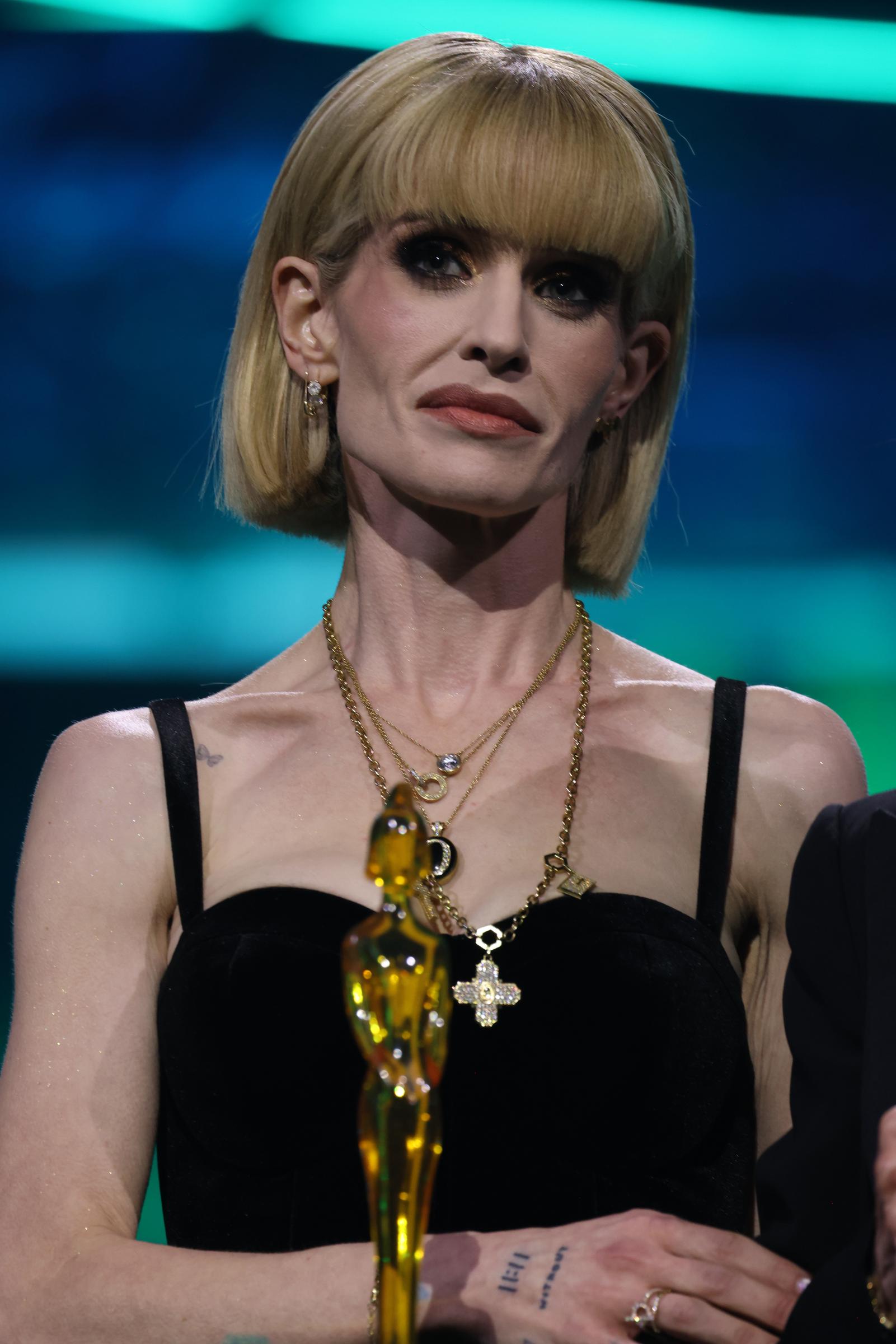 Kelly Osbourne held the award honoring her late father, Ozzy, at the 2026 BRIT Awards, during an emotional appearance she would later admit left her shocked when she saw photographs of herself. | Source: Getty Images.