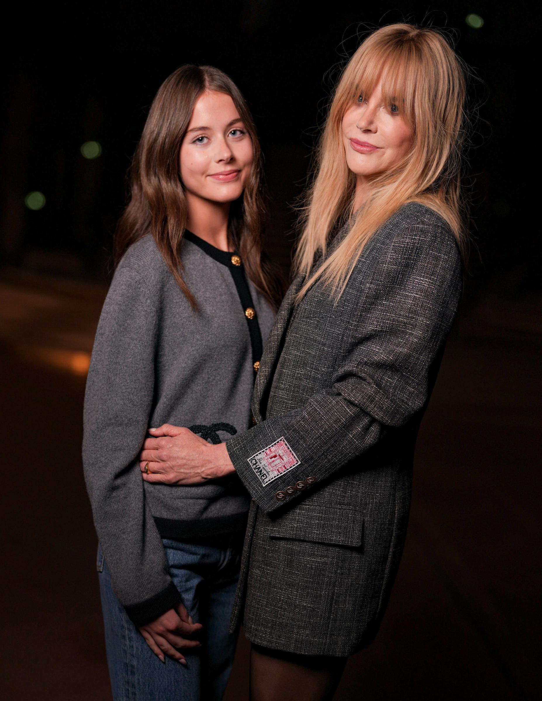 Nicole Kidman holds her 15-year-old daughter, Faith Margaret, close as they pose together at Chanel's Spring/Summer 2027 show during Paris Fashion Week in October 2026. | Source: Getty Images